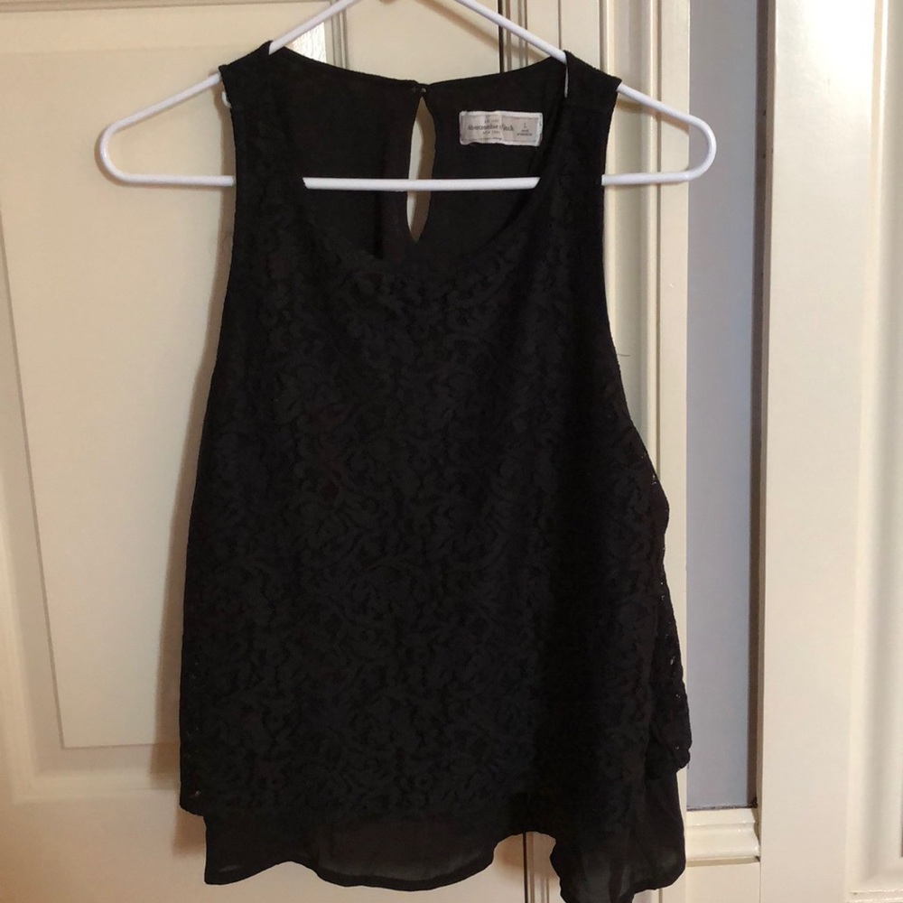 Sleeveless black lace shirt